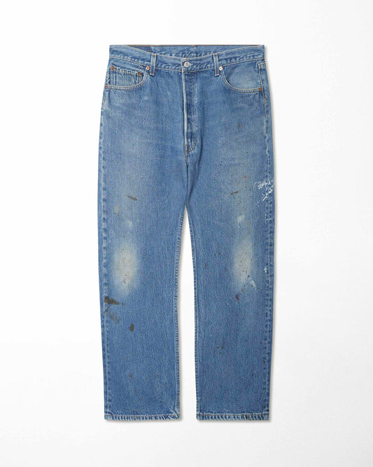 LEVI'S 501XX MID-WASH STAINED JEANS