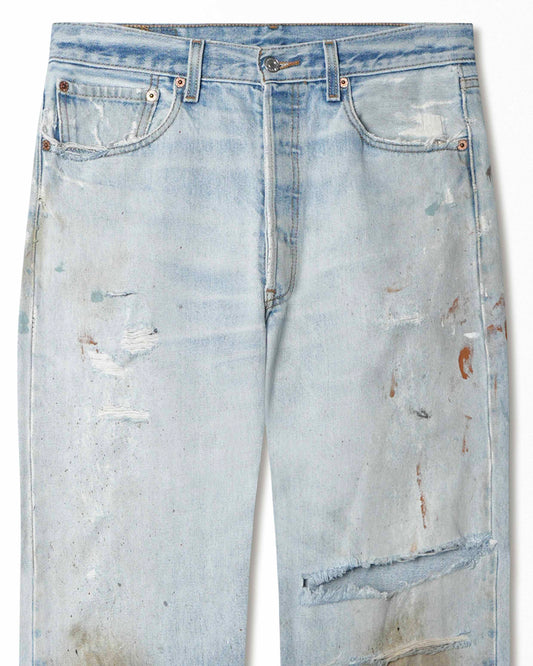 LEVI'S 501XX LIGHT-WASH DISTRESSED STAINED JEANS