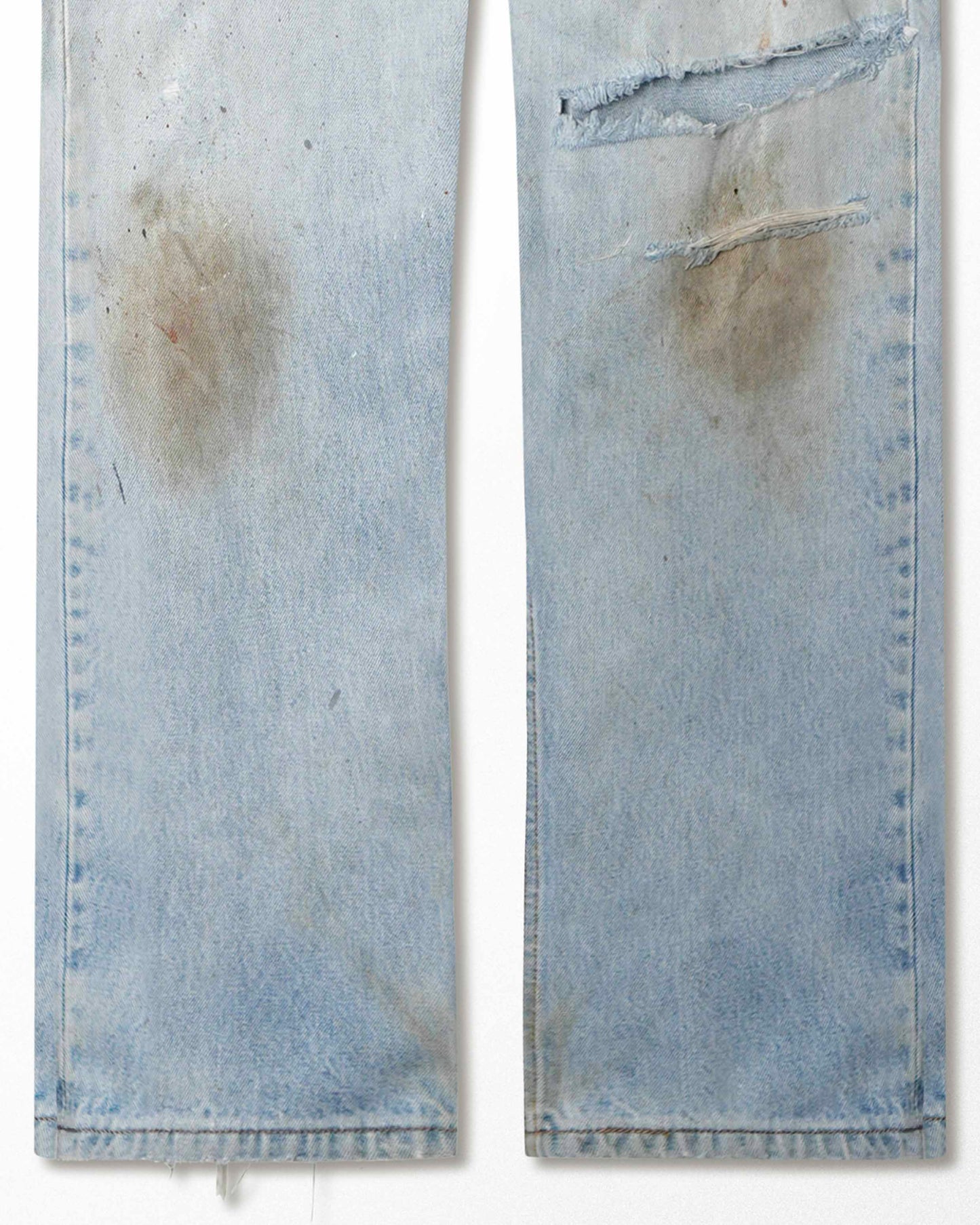 LEVI'S 501XX LIGHT-WASH DISTRESSED STAINED JEANS