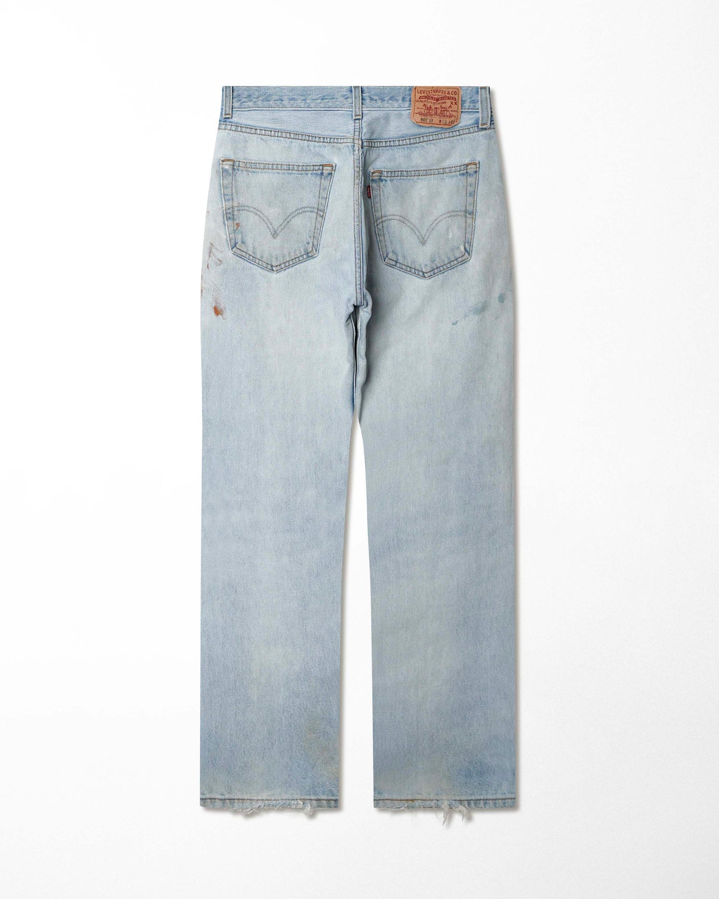 LEVI'S 501XX LIGHT-WASH DISTRESSED STAINED JEANS
