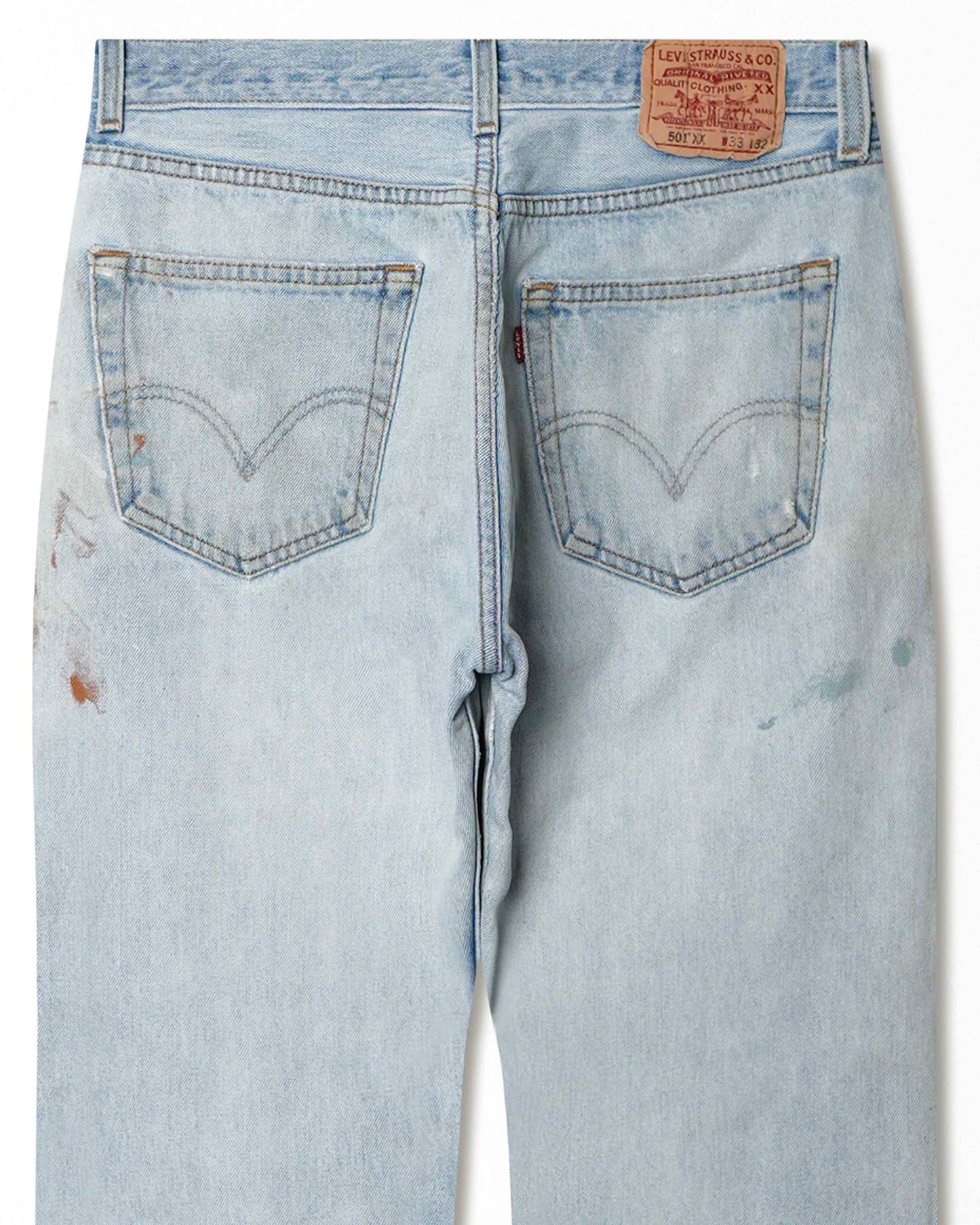LEVI'S 501XX LIGHT-WASH DISTRESSED STAINED JEANS