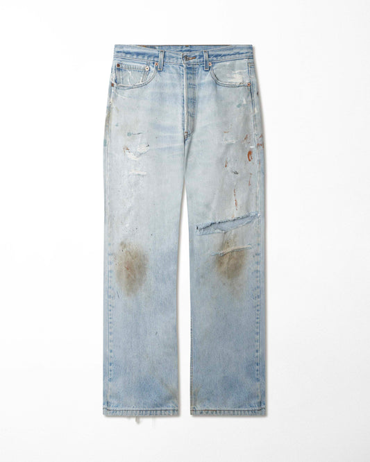 LEVI'S 501XX LIGHT-WASH DISTRESSED STAINED JEANS