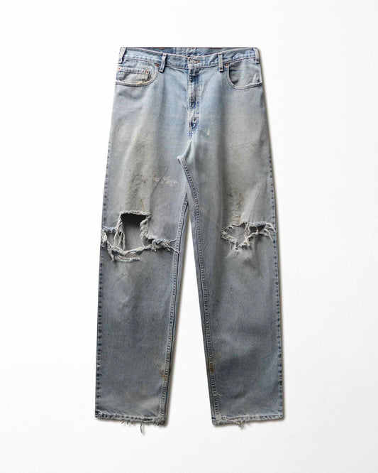 Vintage Levi's 560 Light Wash Ripped Stained Jeans - product view 1