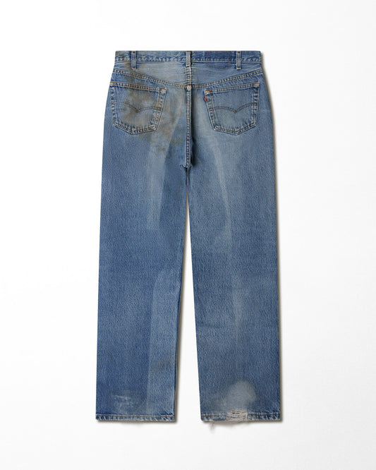 LEVI'S 501 MID-WASH STAINED JEANS