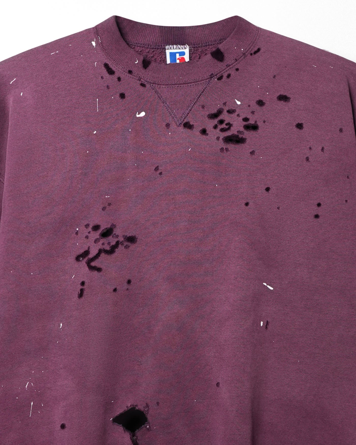 RUSSELL FADED AND DISTRESSED PURPLE SWEATER