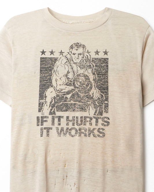 "IF IT HURTS IT WORKS" WHITE DISTRESSED T-SHIRT
