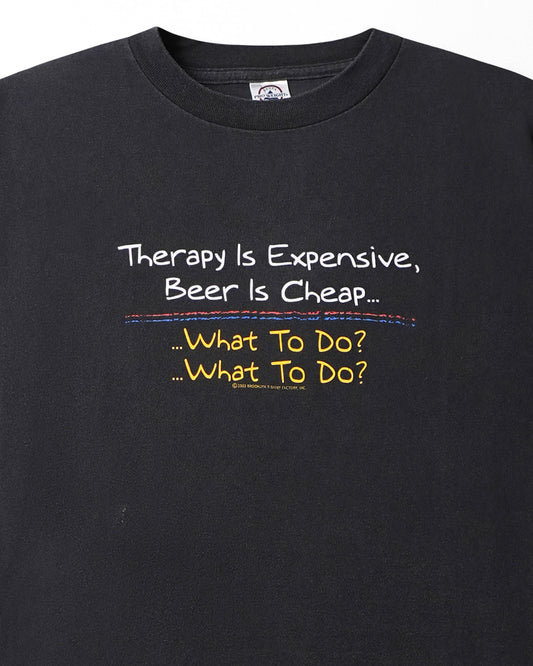 DELTA "THERAPY IS EXPENSIVE" BLACK T-SHIRT